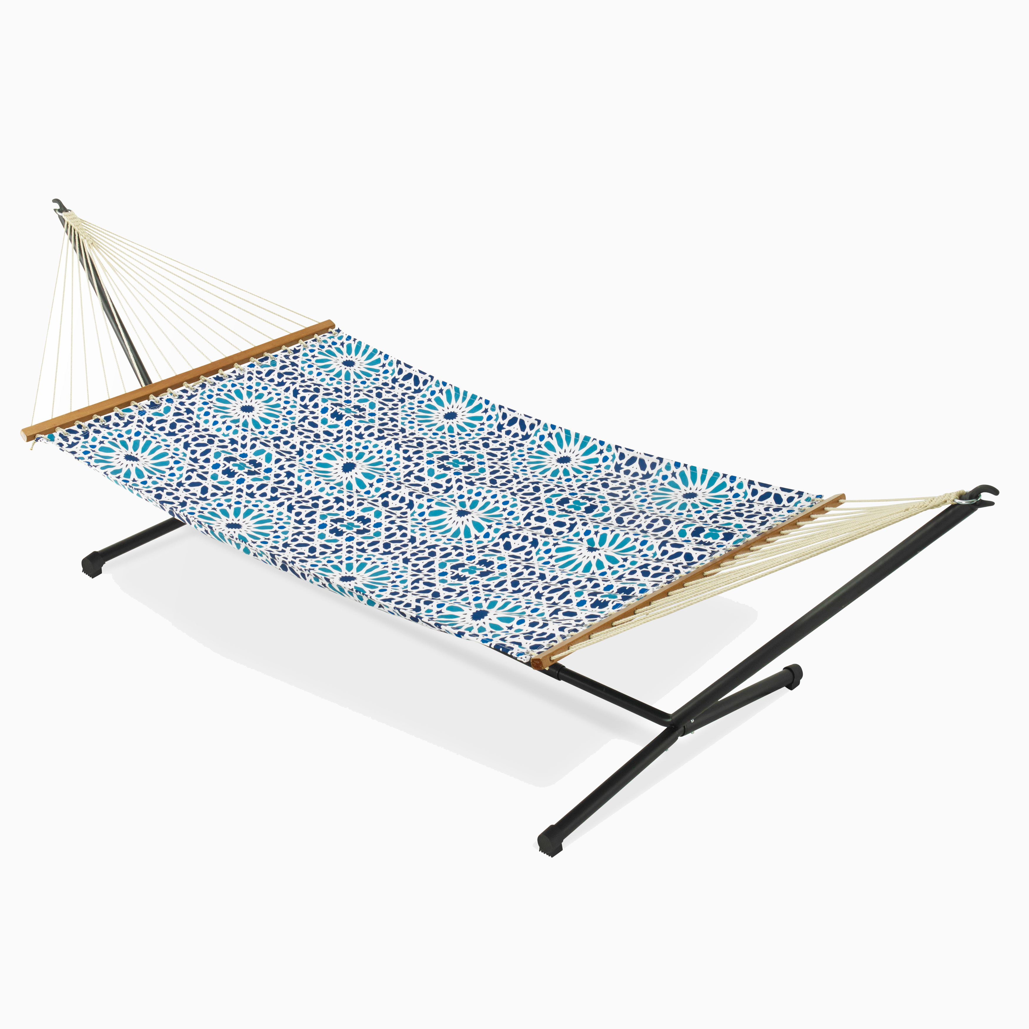Full view of blue mosaic print hammock hung on a black metal stand